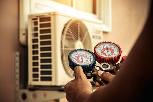 Professional Air Conditioning Service technician working in Waverly, IL